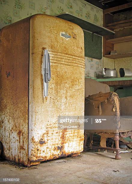 A spooky run down kitchen in an abandoned house.